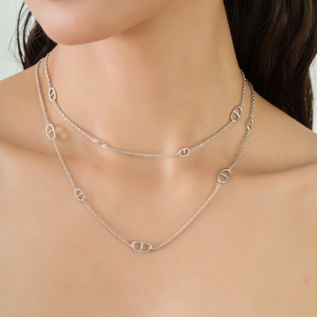 This contemporary minimalist sterling silver anchor link long chain is crafted in 925 sterling silver with a sleek and...