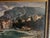 Oil on canvas "Lively Village by the River" Depicts a village against a mountain backdrop Lively scene with a woman...