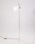 A vintage Coupe 3321 floor lamp by Joe Colombo for Oluce. This is an iconic Italian modern lamp with an award winning...