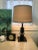 This beautiful lamp was a body made of black resin / plastic and accents in clear lucite. The lamp works like new and was...