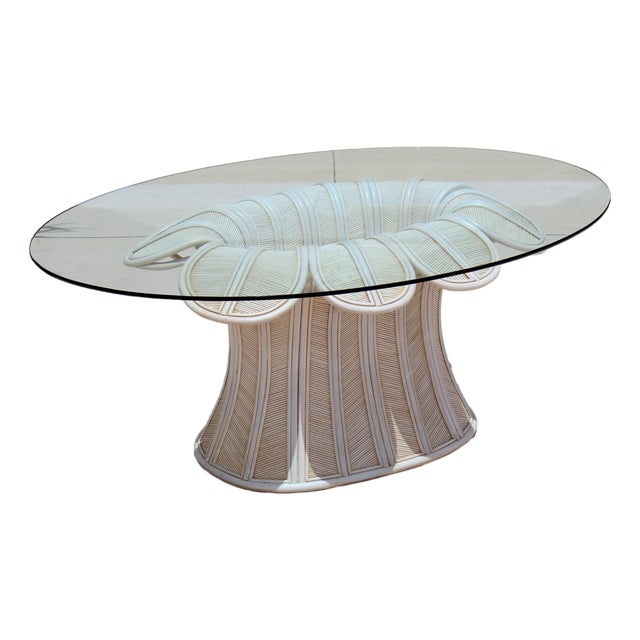 Vintage Hollywood Regency Style Flower Pencil Reed Rattan Pedestal Dining Table With Oval Glass Top For Sale
