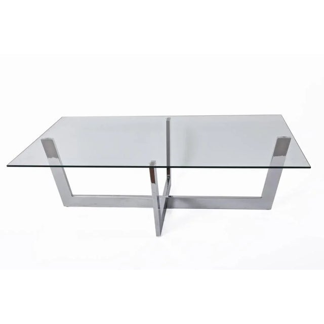Wonderful chromed steel coffee table with crystal glass top. This amazing piece was produced in Italy during 1970s. This...
