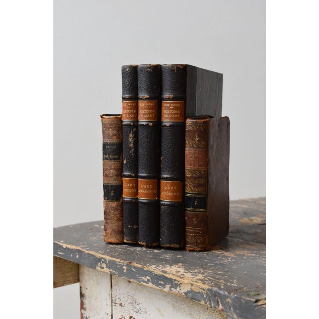 Antique Leather-Bound Book Bookends Made in France, A Pair, Circa Mid-Late 19th Century. Constructed from genuine antique...
