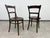 Set of 2 dining chairs by J&J Kohn in excellent vintage condition with signs of use.