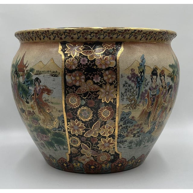 This large-format, hand-painted ceramic pot from China, made around 1900, is a magnificent example of the artistic...