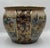 This large-format, hand-painted ceramic pot from China, made around 1900, is a magnificent example of the artistic...
