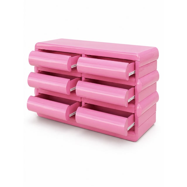 Postmodern Pink Lacquered Bullnose Dresser, featuring six drawers and chic gold accents. This dresser showcases a sleek...