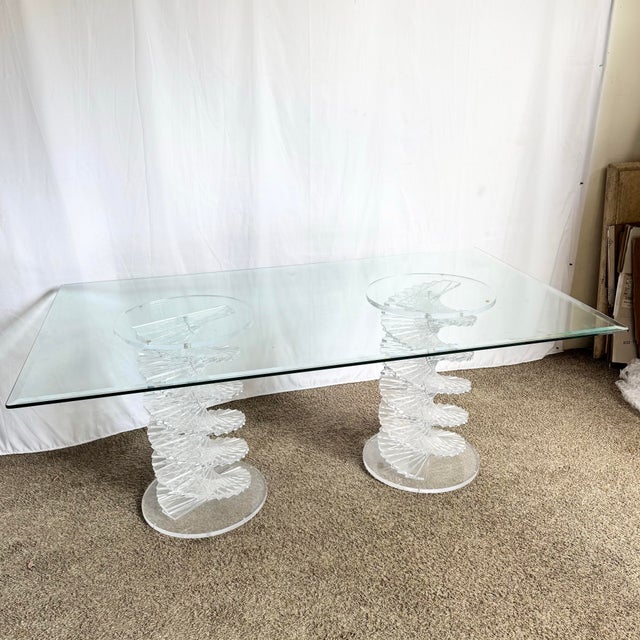 A striking example of postmodern design, this dining table features twin sculptural bases crafted from stacked spiral...