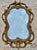 1970's Ornate resin Syroco style wall mirror. Found at an estate sale, encased in a heavy coat of white paint, with the...