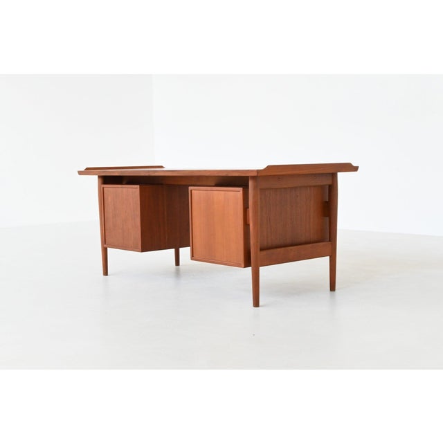 A rare and iconic executive desk from the celebrated “200 series” by Arne Vodder, one of Denmark’s most esteemed...