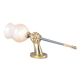 Bronze Fist Wall Sconce with Amber Glass Shade in the style of Maison Jansen, 1950s For Sale