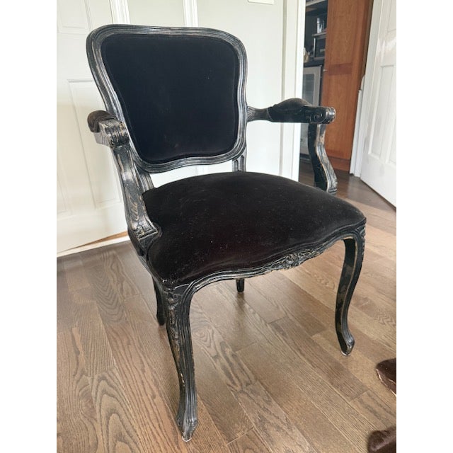 A striking interpretation of classic Louis XV French provincial seating. This "Orleans" armchair features an elegantly...