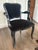 A striking interpretation of classic Louis XV French provincial seating. This "Orleans" armchair features an elegantly...