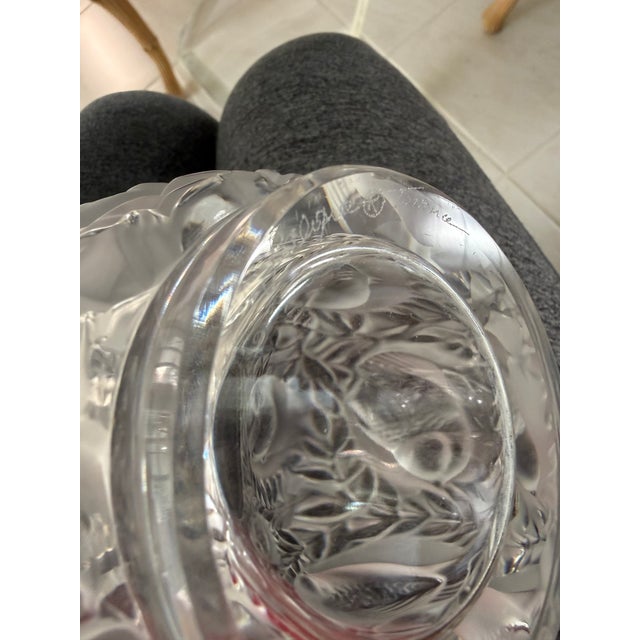 Originally designed by Rene Lalique in 1939, it features a frosted crystal finish with high-relief molded sparrows nestled...