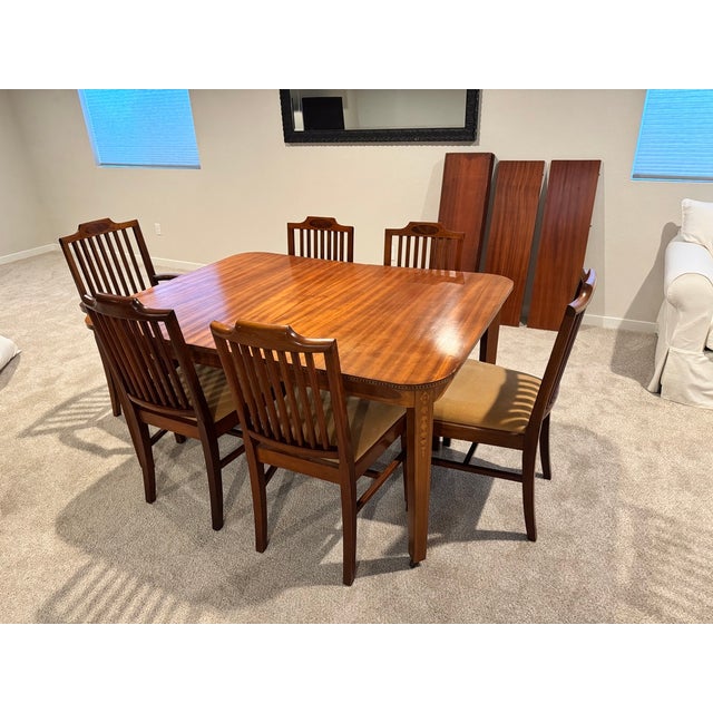 Discover a stunning antique dining set that promises to elevate your dining experience. The exquisite extending dining...