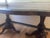 Clover Leaf Pedestal Table in Dark Wood. Ornate leg carvings. The table was well taken care of since purchased in the...