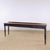 A beautifully proportioned antique mahogany serving table featuring an exceptionally long and narrow profile. The rich...