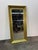 This impressive oversized mirror features a substantial brass frame with a bold architectural presence. The frame is...