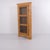 Antique corner cabinet crafted from pine with a glass door and three interior shelves. The cabinet was made in the 1890s...