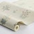 Inspired by 18th- and 19th-century French textiles, Boråstapeter Ängsflora features bouquets of hand-painted...