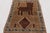 Hand-knotted in wool and originating circa 1950-1959 from Afghanistan, this 3x5 vintage Gabbeh rug joins Rug & Kilim’s...