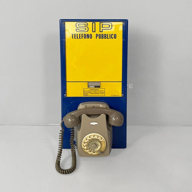 Mid-Century Modern Italian Wall-Mounted Public Telephone in Metal from SIP, 1960s, in Worn conditions. Designed 1960 to 1969