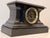 Ingraham Victorian Ansonia mantel clock with a black with a lacquer finish, runs perfect and rings ever hour. Gold rim...
