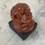 Handmade expressionist sculpture of a man. Facial expressions are curious! Would make a great bookshelf item or feature....