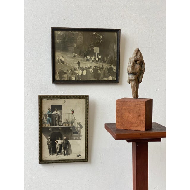 Vintage Glazed Stoneware Head Mounted on Teak Base, Circa 1950s. Elongated head form with exaggerated features and a...