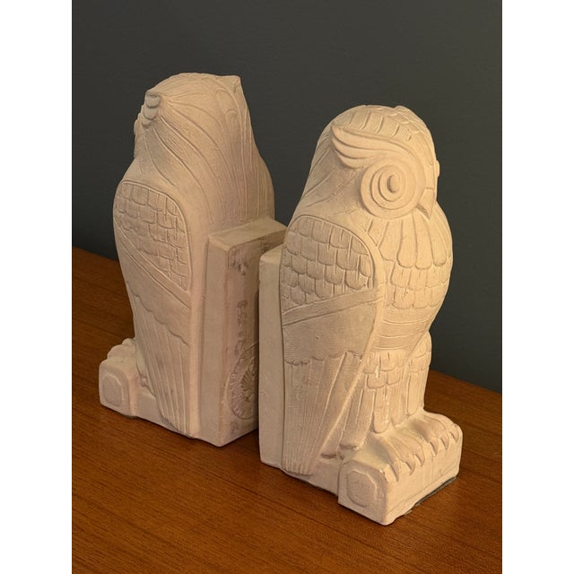 Pair of Art Deco owl form bookends. Cast sandstone with impressed seal mark on the reverse reading Library of Congress....