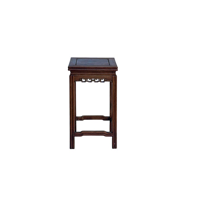 Crafted with exquisite traditional joinery, this vintage Chinese square wood table features a rich, warm-toned wood grain...