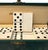 Mid-Century Modern Vintage Abercrombie & Fitch Faux Ivory Domino Set in Green Case With Brass Clasp, Circa 1930 For Sale - Image 3 of 5