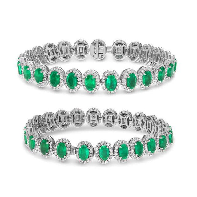 18k White gold bracelet with 24 oval emeralds weighing 9.55 carats and 384 round brilliant diamonds weighing 2.85 carats....