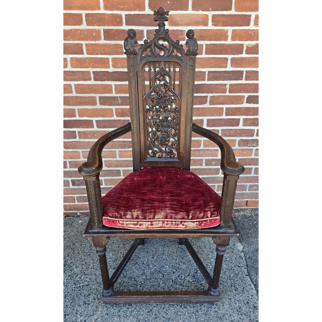 Great pair of 19th century Gothic Revival tall armchairs. These chairs have a nice sculptural quality with two lions...