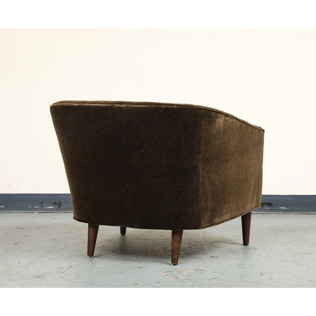 A classic vintage midcentury style Italian lounge chair, newly upholstered in JB Martin Bitter Chocolate Mohair. The...