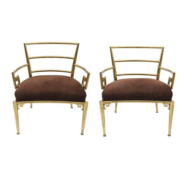 These iconic and highly sought after vintage Mastercfaft brass and upholstered side or lounge chairs have the iconic greek...