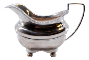 Silver Creamer with Grooved Edge and Round Feet