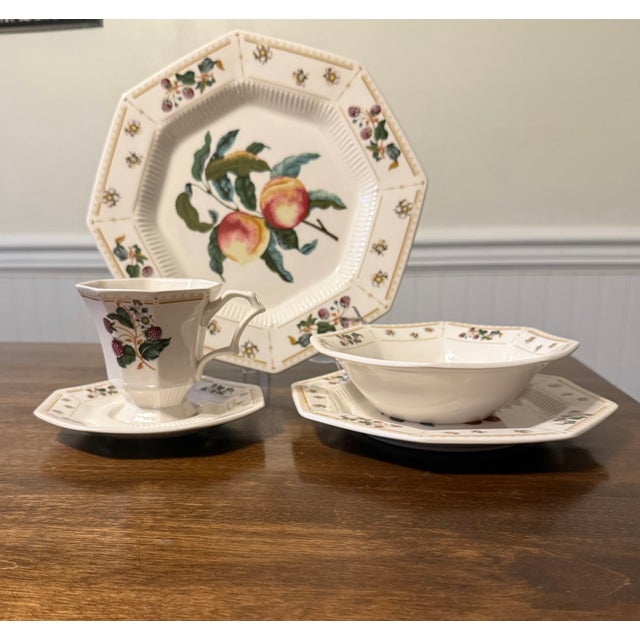 This collection consists of six of each, dinner plates, salad plates, bowls, cups and saucers. Crafted from porcelain,...