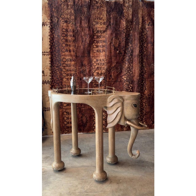 Whimsical rolling Hollywood Regency bar car in the form of an elephant designed by Marge Carson. The 20th century cart...