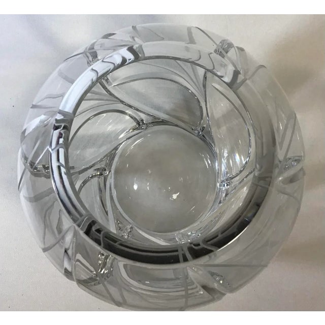 This beautiful 7” cut glass floral urn with a 3” opening, picks up light and reflects beauty whether empty or full of...