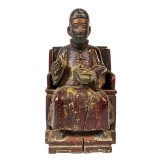 Early 19th Century Chinese Wooden Figurine of a Scholar Holding a Book For Sale