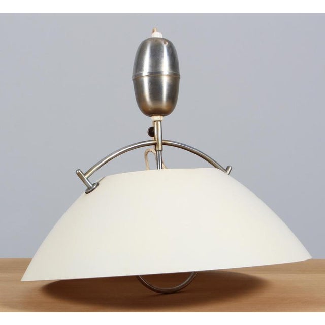 Hans J. Wegner pendant of white lacquered aluminium. Model HJW37, made by Louis Poulsen Up to 250V (Europe/UK...