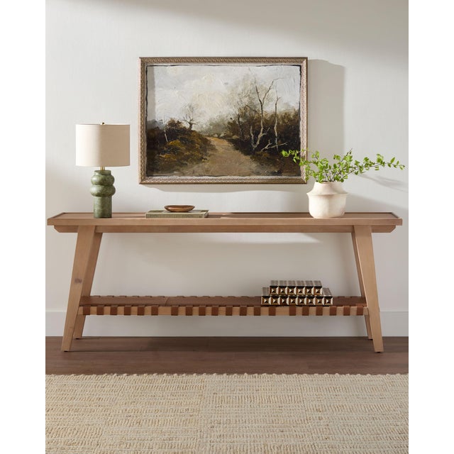 Introducing the Taft Console Table, a captivating fusion of mid-century modern flair and timeless elegance. Crafted in...