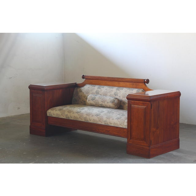 Absolutely stunning, this early 19th-century sofa hails from the Empire period, showcasing impeccable craftsmanship and...