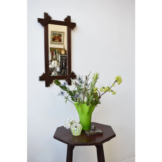 Antique Elongated Cross-hatch Mirror, Circa Early 20th Century. This exaggerated folk frame is constructed from leftover...