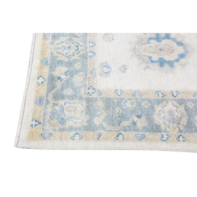 Turkish Oushak Runner Soft Blue & Ivory Handwoven Wool Rug 2'11" X 9'2" This Turkish Oushak runner is crafted from...