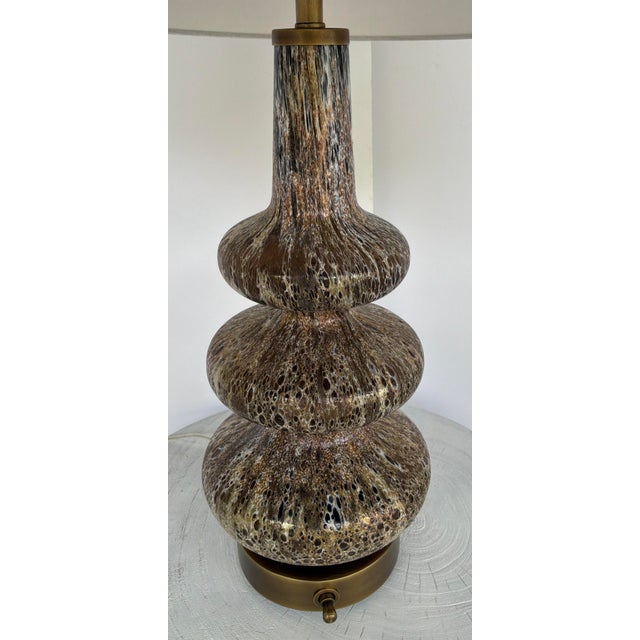 Original retail $1167, stylish Revelation Modern Hand Blown Glass Waggle Table Lamp, off-white fabric shade, antique brass...