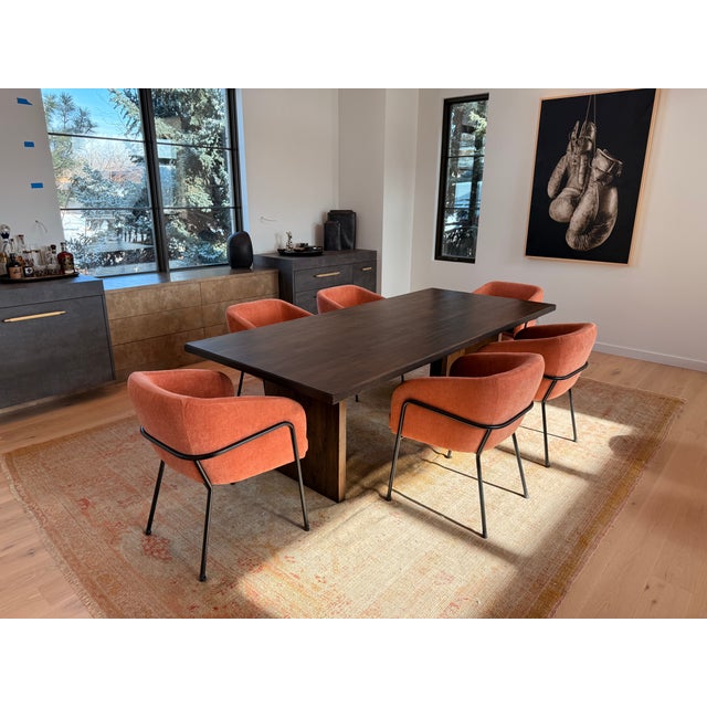 A beautiful, timeless, supremely comfortable dining chair that will never go out of style! Classic matte black metal legs...