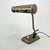 Adjustable table or desk lamp with a brass look patina. Made in Poland in the 1940's. Bulbs: 1x E14. Up to 250V (Europe/UK...