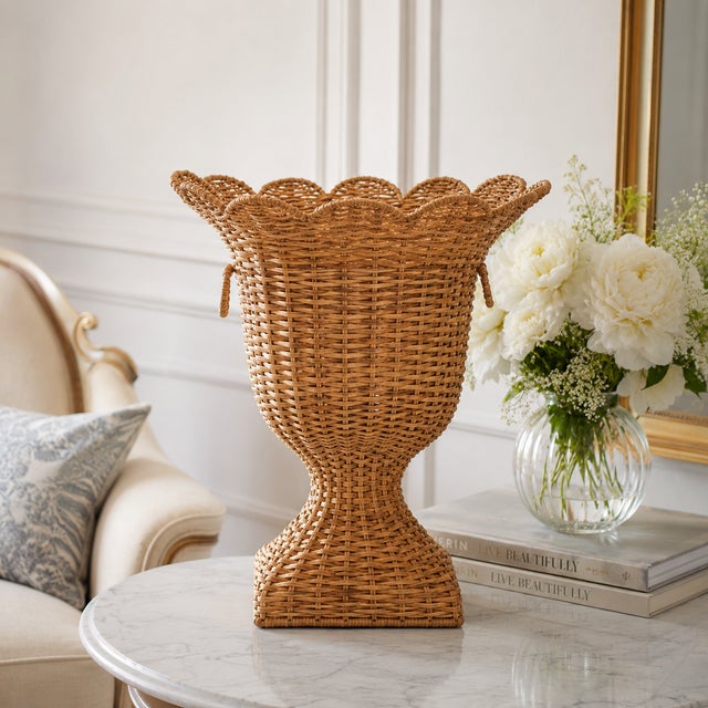 This striking Square Scalloped Trim Wicker Urn brings timeless elegance and natural texture to any interior space. Its...